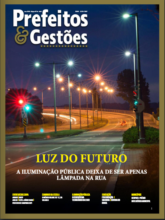 Capa da revista prefeitos e Gestões. Uma rua iluminada com postes durante o período da noite. A capa traz as principais matérias do mes.